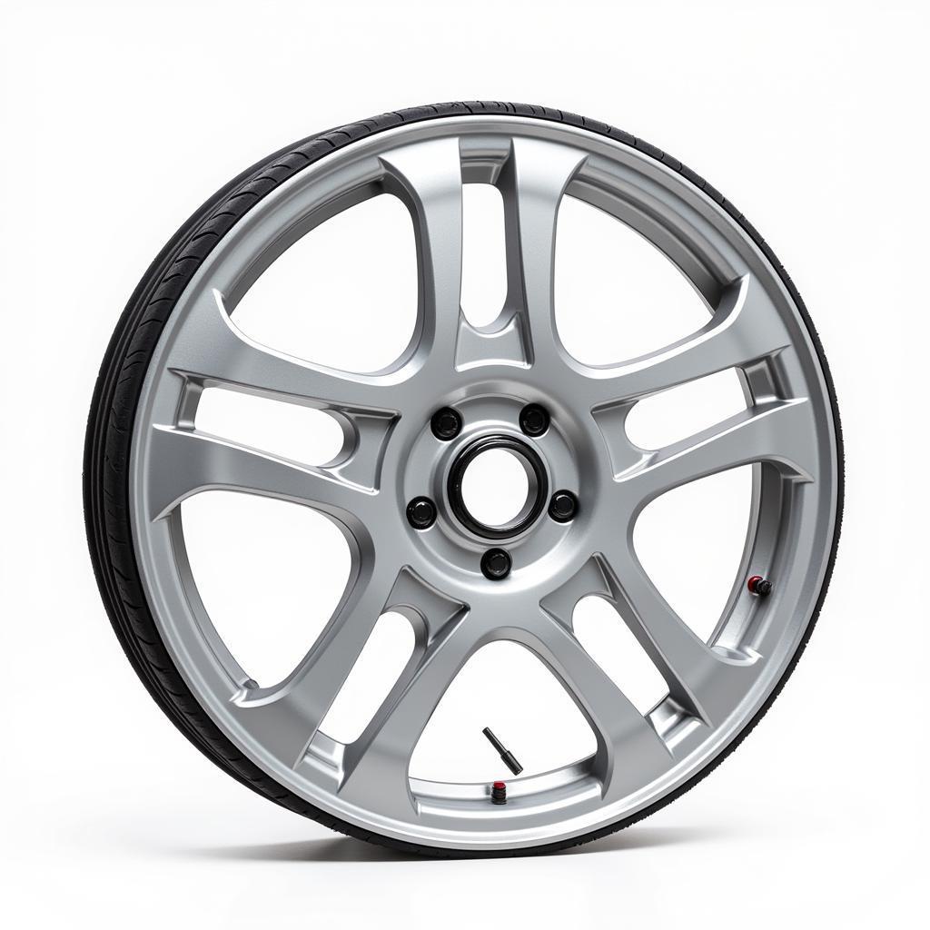 Cấu tạo chi tiết của một bánh xe ô tô, giải thích các thành phần chính như vành, lốp, van, moayơ